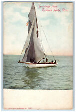 c1905 Greetings from Delavan Lake Wisconsin WI Sailboat Scene Postcard picture
