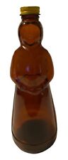 Mrs. Butterworth's Amber Glass Bottle 10 Inches Tall With A Metal Lid picture