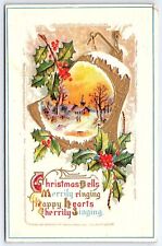 1912 Christmas Bells Merrily Ringing Snowy Houses Landscaped Posted Postcard picture