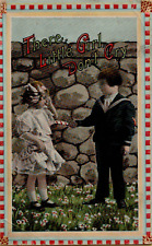 Antique Postcard 1913 Boy handing Girl Candy 