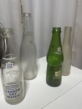 LOT OF 4 Collectible OLD GLASS CANADA DRY BOTTLES picture
