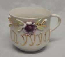Antique Porcelain Mug with Embossed Flower and Mama  picture