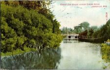 1913. JANESVILLE, WIS. STREET CAR BRIDGE ACROSS SPRING BROOK. POSTCARD II1 picture