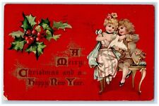1908 Christmas And New Year Children Holly Berries Winnipeg Manitoba Postcard picture
