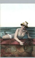 RISQUE WOMAN BATHING SUIT BEACH BEAUTY CLIMB SEA WALL c1910 antique postcard picture