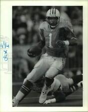 1991 Press Photo Houston Oilers football quarterback Warren Moon scrambles picture