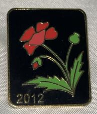 Beautiful Pinback 2012. Rectangle. Red rose with black background  picture