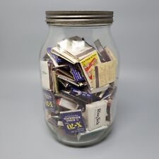 Glass Jar Full Of Vintage Matchbooks picture