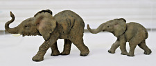 Elephants Figurines Pair African Running Junenile Trunk Raised Graite Gray picture
