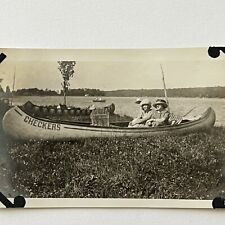Vintage Snapshot Photograph Beautiful Women Sitting In Checkers Canoe picture