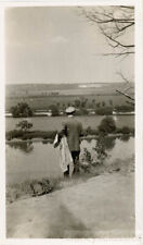 1917 Man Surveying Landscape From the Back Holds Coat picture