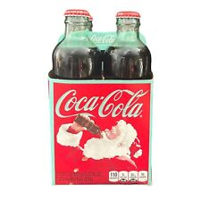 125th Annversary Coca-Cola Special Edition Vintage Bottle Santa 4 Pack Unopened picture
