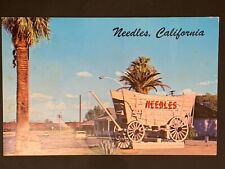 Needles California Route 66 Covered Wagon Sign Railroad Vintage Postcard picture