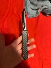 Krate Tactical Carbon Fiber Knife. Black with a little red picture