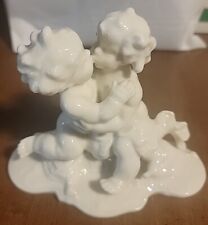 HUTSCHENREUTER Selb Germany porcelain figurine CHERUBS PUTTI or CHILDREN kissing picture