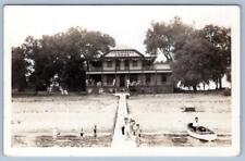1920-40's RPPC CRANDALL'S LODGE SPIRIT LAKE IOWA PIER SWIMMERS BOAT POSTCARD picture