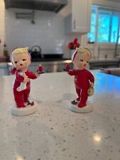 2 VINTAGE NAPCO 1957 CHRISTMAS FIGURINES- 2 CHILDREN IN RED SLEEPER PAJAMAS  picture