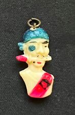 Vintage Celluloid Charm Pirate Head with Knife Eye Patch Bandana Jewelry Prize picture