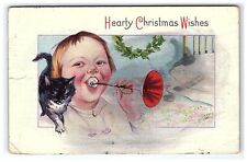 1925 Postcard Hearty Christmas Wishes Child Blowing Horn Cat Pose picture
