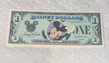 1987-A $1 Disney Dollar. First Issue. Disneyland. Mickey Mouse. CU. picture