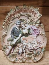 Bisque Porcelain Victorian Man And Woman With Cherub Wall Plaque picture