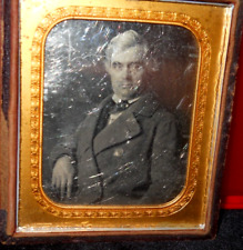 1/6th Size Scovills Daguerreotype of man in half case picture