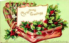 1908 International Art Postcard Christmas Greetings Luggage Holly Embossed UDB picture