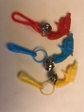 Vintage 80's Plastic Bell Charm Pistols Lot of 3 Pre-Owned picture
