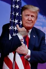 PRESIDENT DONALD TRUMP HUGGING AMERICAN FLAG 4X6 PHOTO POSTCARD picture