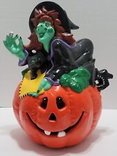 Vintage Lighted Witch On A Pumpkin Ceramic Halloween Decoration  picture