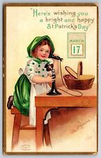 Ellen H Clapsaddle St Patricks Day~Girl Kneels at Table~Candlestick Phone~1911 picture