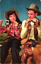 Cowgirl Cowboy Rolling a Cigarette Ride Em and Roll Em Postcard 1950s Boot Spurs picture