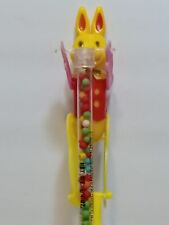 Vintage Easter Bunny candy container acrobat slide and jump candy tube Rosen 15