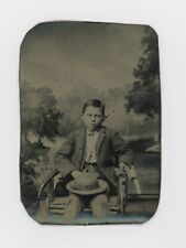 Ca. 1870's-1880's TINTYPE SERIOUS LOOKING BOY HOLDING A REAL SIX GUN PISTOL picture