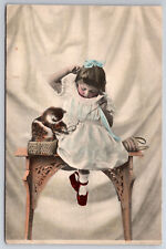 Vintage C1910 Postcard Adorable Girl Playing With Her Kitten picture