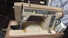 Brown vintage dressmaker sewing machine picture