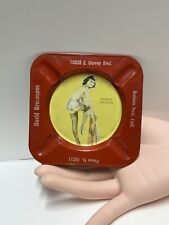Vintage 1950's Pinup Girl Metal Ashtray French Dressing picture