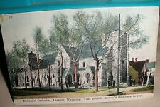 ANTIQUE POSTCARD EPISCOLPAL CATHEDRAL-BISHOP'S RESIDENCE IN BACK- LARAMIE, WYO - picture