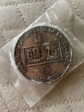 GM Oldsmobile Lansing Michigan 75 Years Of Excellence Medallion Vintage picture