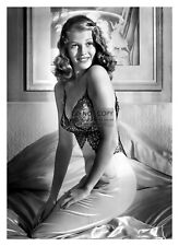 RITA HAYWORTH SEXY ACTRESS SITTING ON BED 5X7 PUBLICITY PHOTO picture