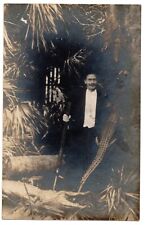 RPPC Real Photo Postcard - Man with gun, holding alligator, undivided back picture