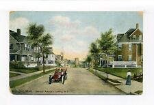 Arlington MA postcard, man driving car, woman walking, Barlett Avenue picture