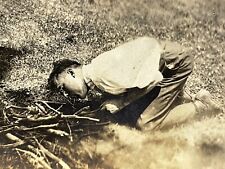 U3 Photograph 1910-20's Handsome Man Stoking Starting Campfire On Ground Blowing picture