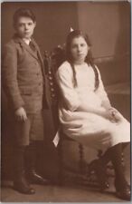 1910s RPPC Studio Photo Postcard Two Bored Little Rich Kids in Nice Clothes picture