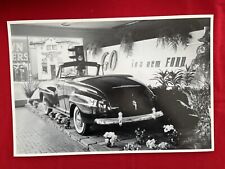 Big Vintage Car Picture.  1948 Ford Super De Luxe Convertible In Dealer Showroom picture