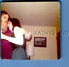 FOUND COLOR PHOTO G+1551 MAN POSED HOLDING PRETTY WOMAN picture