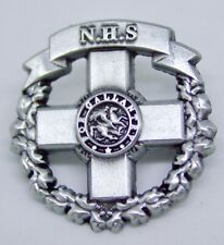 75th anniversary of the National Health Service, George Cross pin badge. NHS picture
