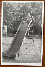 Beautiful boy goes down the hill Vintage photo picture