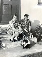 (AnE) FOUND Photo Photograph Two Old Ladies And Their Pet Skunk Black & White picture