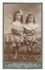 TWO ADORABLE SISTERS SITTING ON A BENCH IN NERAC, FRANCE (CDV) picture